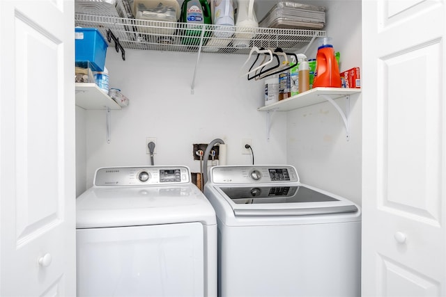 laundry area featuring laundry area and independent washer and dryer