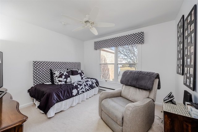 bedroom with light carpet, baseboards, baseboard heating, and a ceiling fan