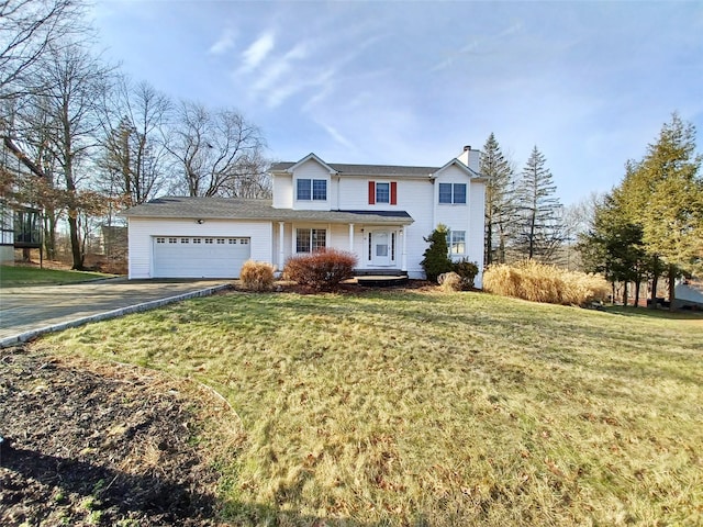 traditional home with an attached garage, driveway, a chimney, and a front lawn