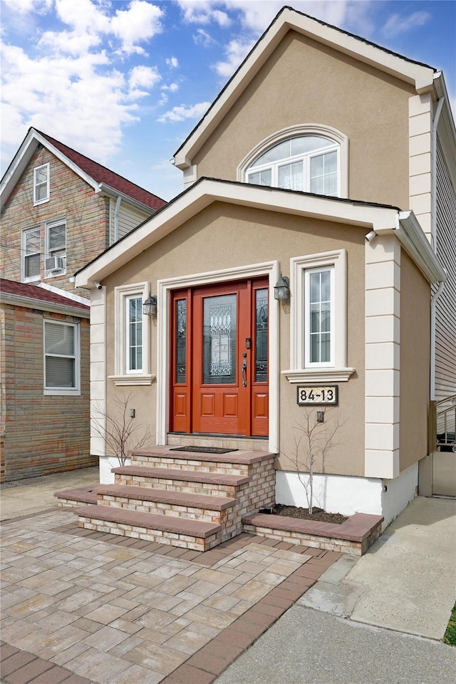 view of front of property featuring stucco siding