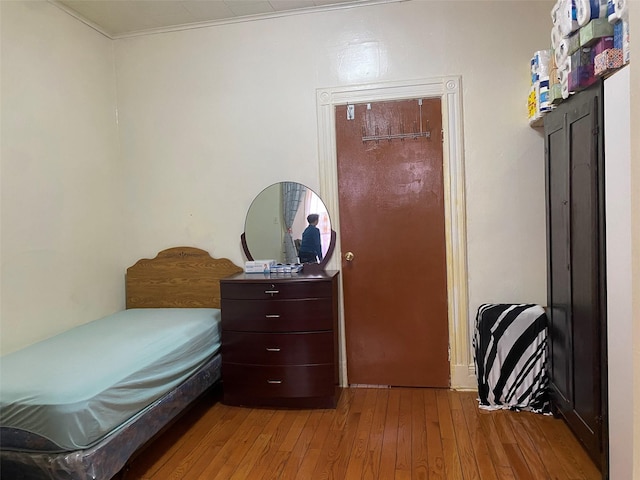 bedroom with light wood-style flooring