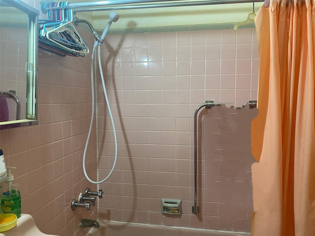 full bathroom with shower / tub combo with curtain