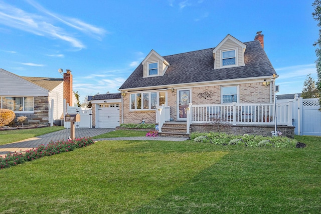 cape cod house featuring a porch, a front yard, brick siding, and driveway