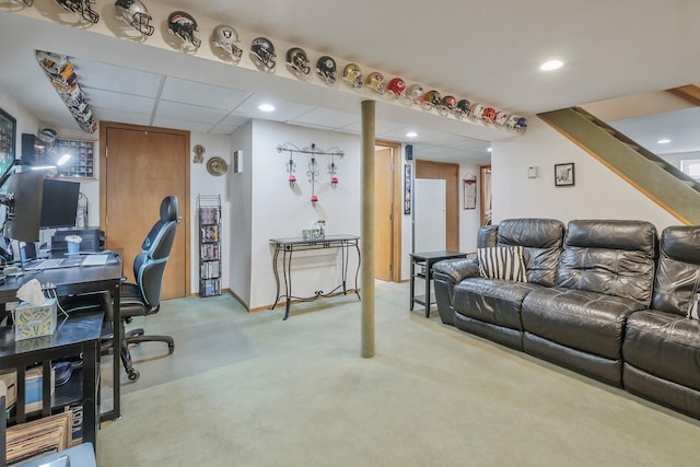 living room featuring light carpet, a paneled ceiling, and recessed lighting