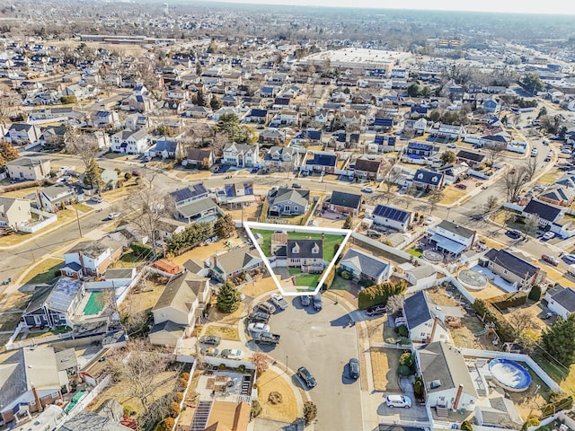 birds eye view of property with a residential view