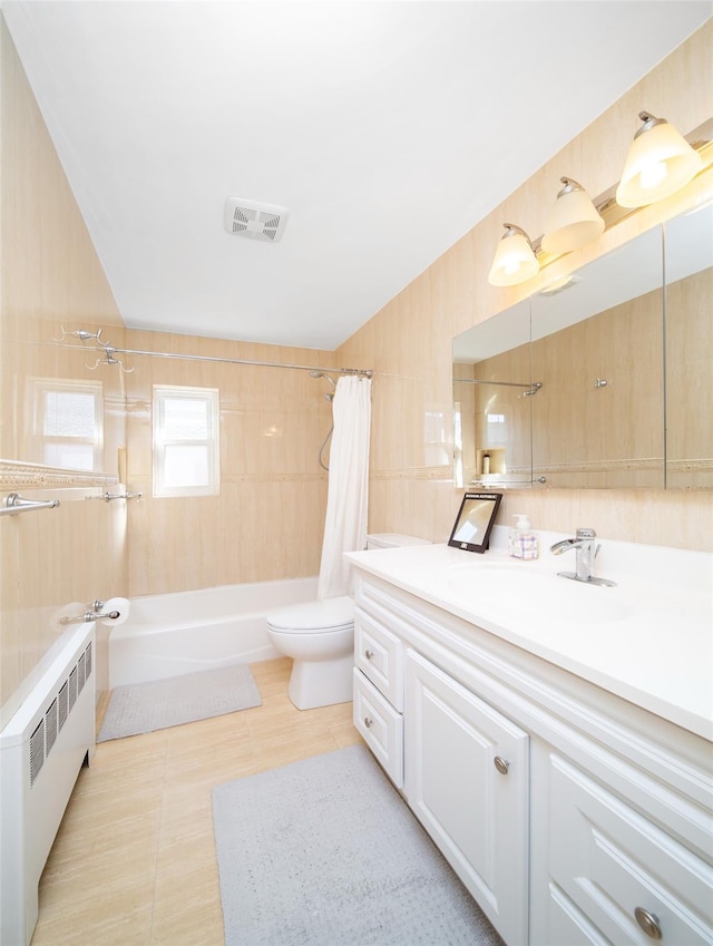 full bath with shower / bath combo, visible vents, toilet, radiator heating unit, and vanity