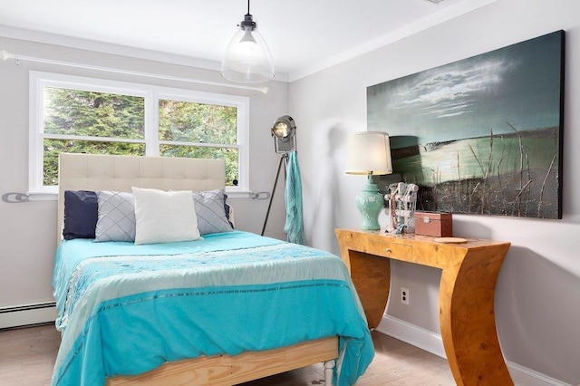 bedroom with light wood-style floors and ornamental molding