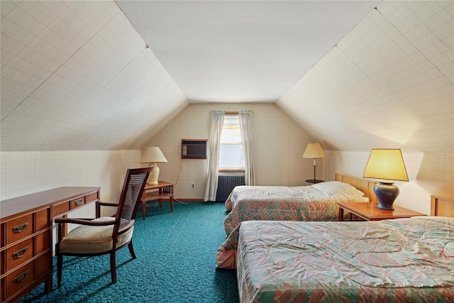 bedroom with dark carpet, radiator, a wall unit AC, and vaulted ceiling