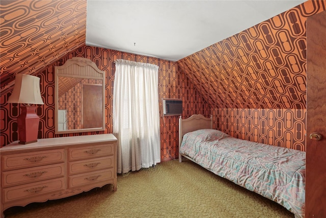 carpeted bedroom with vaulted ceiling and wallpapered walls