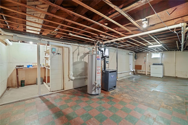 basement with washer / clothes dryer and gas water heater