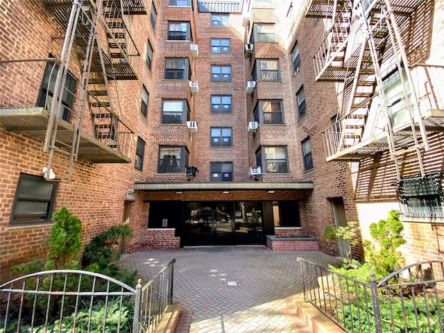 view of building exterior featuring fence