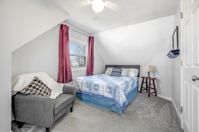 bedroom featuring vaulted ceiling, carpet floors, a ceiling fan, and baseboards