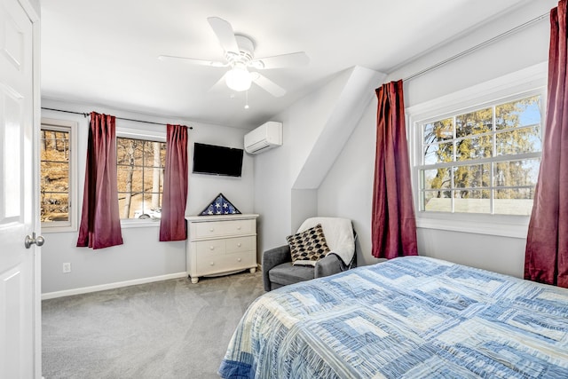 carpeted bedroom featuring multiple windows, baseboards, a ceiling fan, and a wall mounted AC