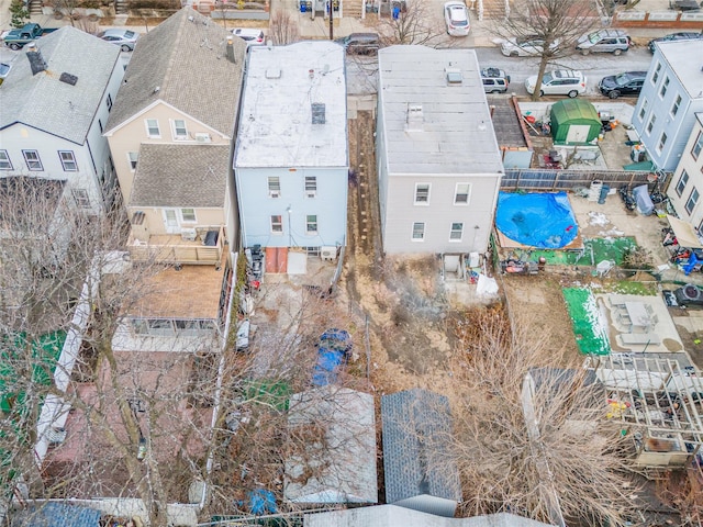 birds eye view of property with a residential view