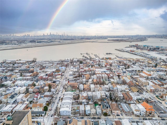 drone / aerial view with a water view and a city view