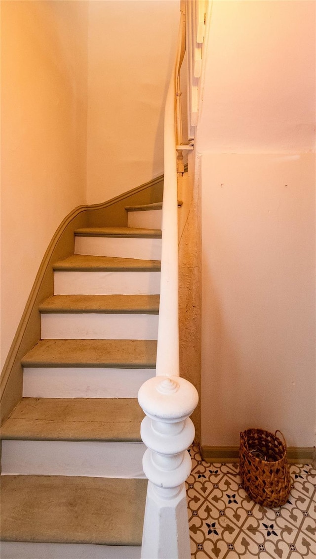 stairway with baseboards