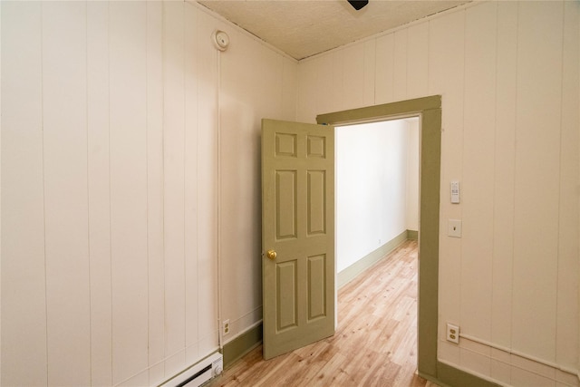 spare room with light wood-type flooring