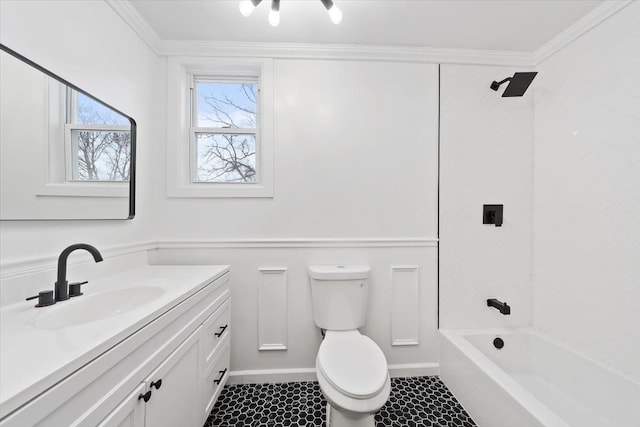 full bathroom featuring bathtub / shower combination, toilet, ornamental molding, vanity, and tile patterned flooring