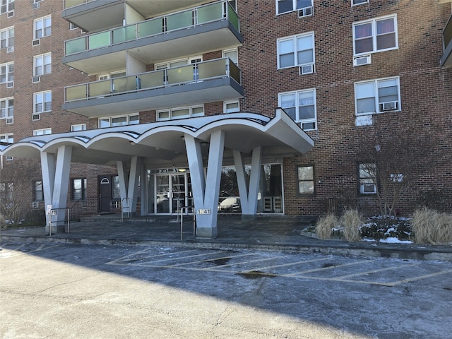 view of building exterior with cooling unit