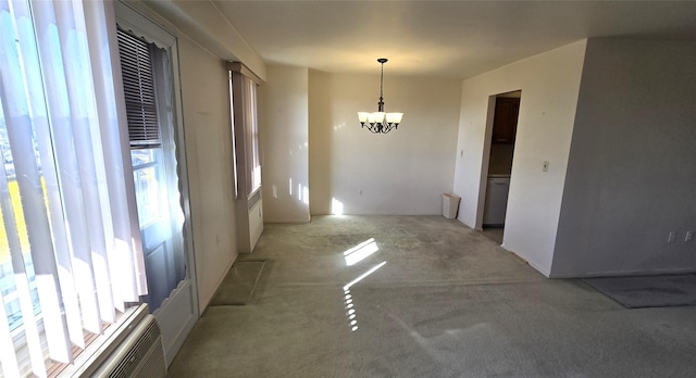 unfurnished dining area featuring a notable chandelier