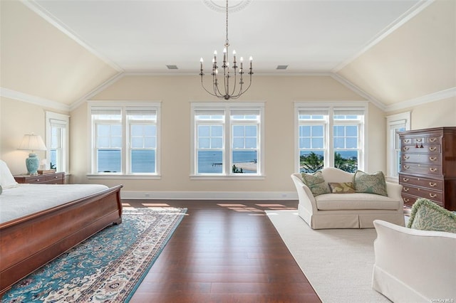 bedroom with lofted ceiling, an inviting chandelier, dark wood-type flooring, and crown molding