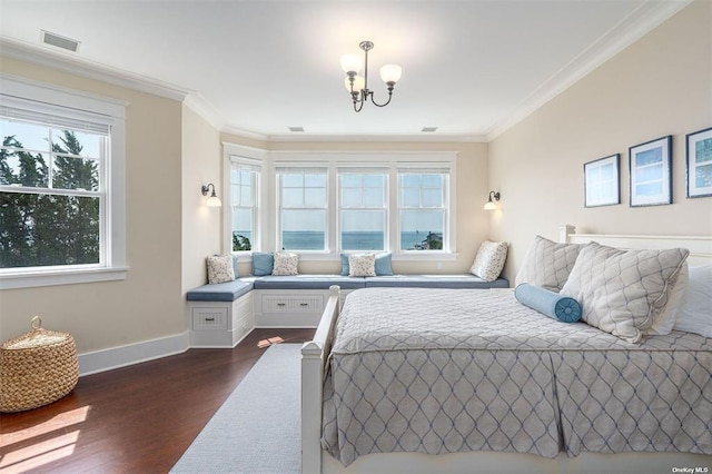 bedroom with dark wood-style flooring, visible vents, crown molding, and baseboards