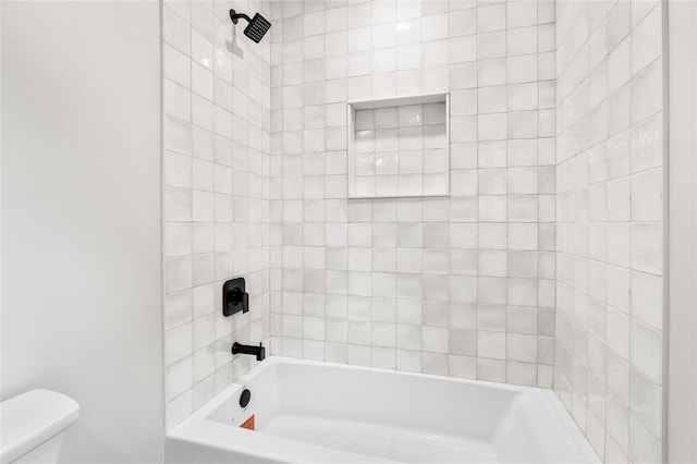 bathroom with shower / tub combination and toilet