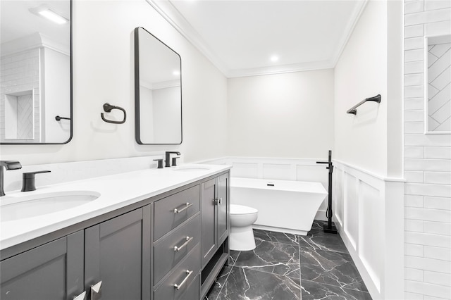 full bathroom with wainscoting, marble finish floor, ornamental molding, and a sink