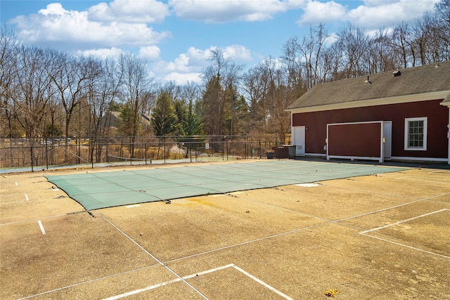 view of pool featuring a patio area, fence, and a fenced in pool