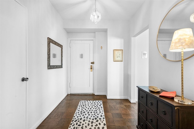 foyer entrance featuring baseboards