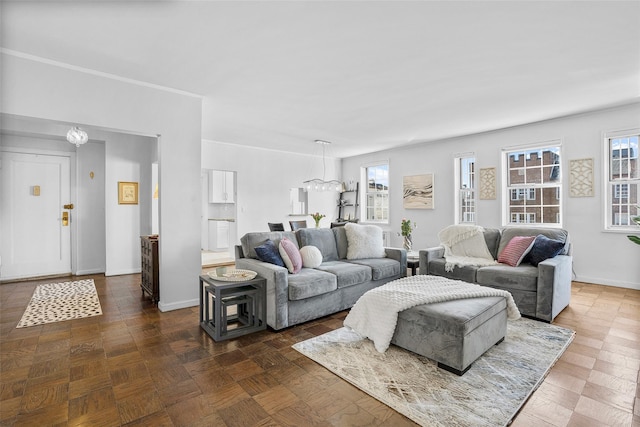 living room featuring baseboards