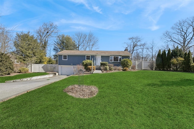 single story home with driveway, a front lawn, an attached garage, and fence