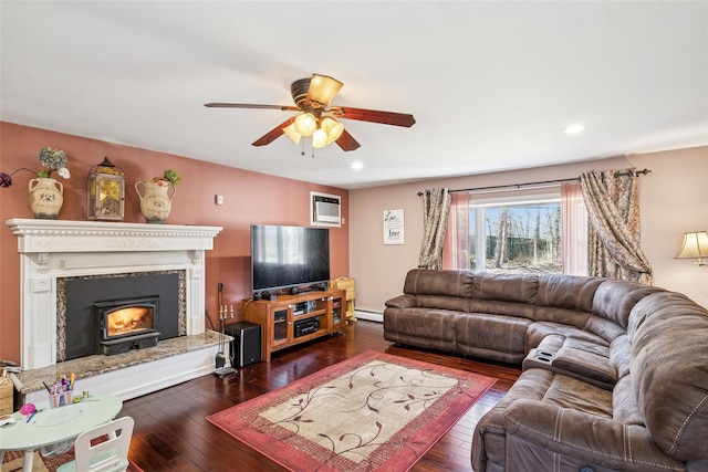 living room with ceiling fan, hardwood / wood-style floors, a wall mounted air conditioner, baseboard heating, and recessed lighting