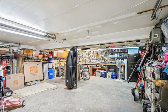 garage with a workshop area