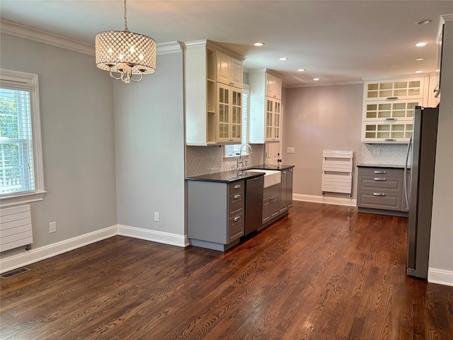 kitchen featuring dark wood-type flooring, visible vents, appliances with stainless steel finishes, gray cabinets, and glass insert cabinets