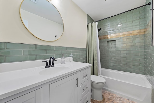 full bath with wainscoting, toilet, shower / bathtub combination with curtain, vanity, and tile walls