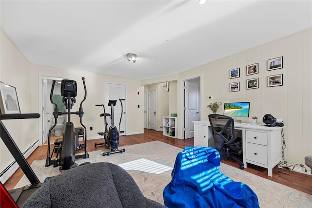 exercise area with wood finished floors