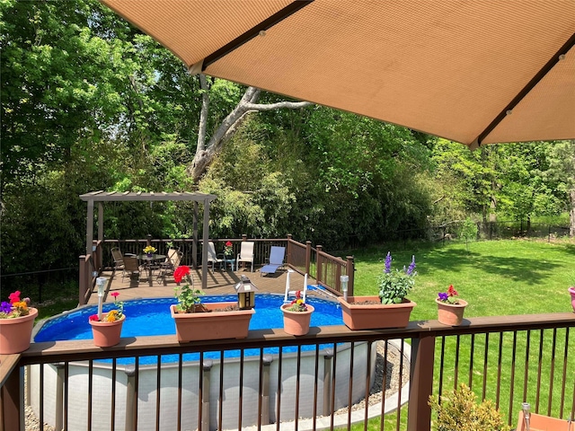 exterior space with a fenced in pool, a fenced backyard, a deck, a yard, and outdoor dining space