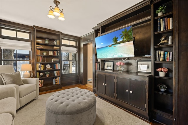 living area with an inviting chandelier