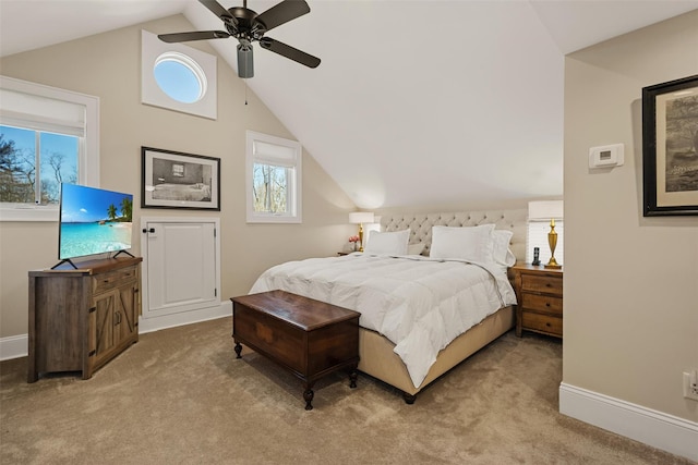 carpeted bedroom featuring a ceiling fan, vaulted ceiling, and baseboards