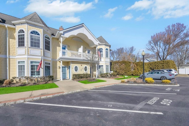 view of front of property featuring uncovered parking