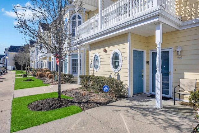 doorway to property with a balcony