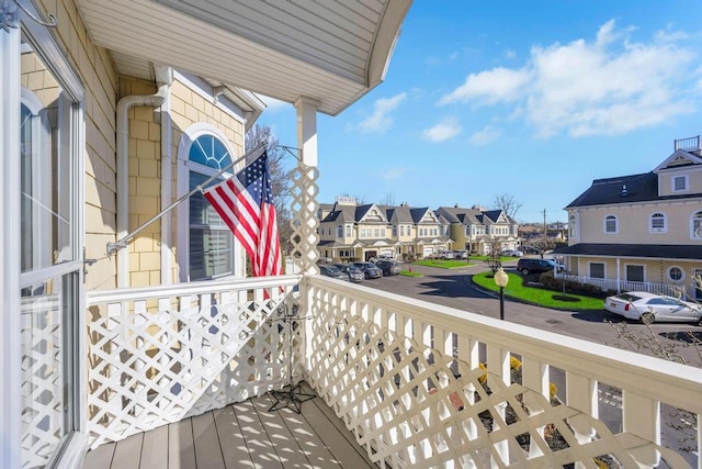 balcony featuring a residential view