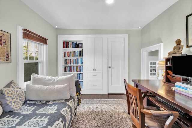 bedroom with wood finished floors