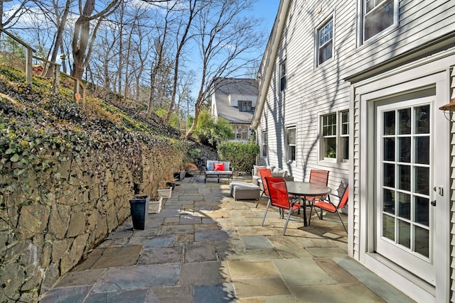 view of patio / terrace featuring outdoor dining space and a fenced backyard