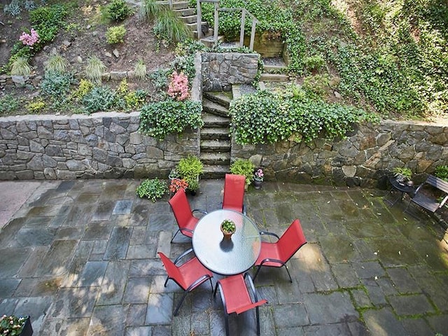 view of patio featuring stairway