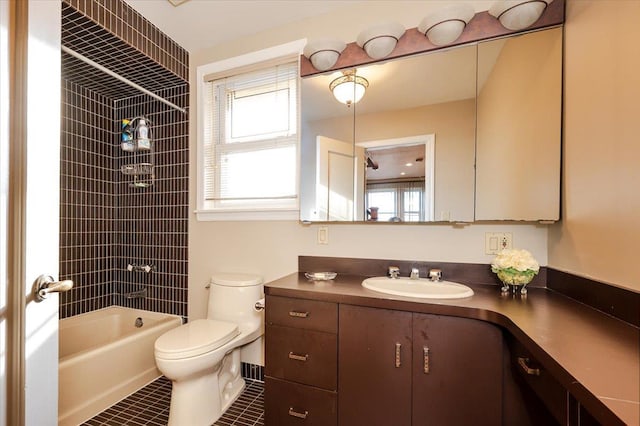 full bathroom featuring shower / tub combination, tile patterned flooring, vanity, and toilet