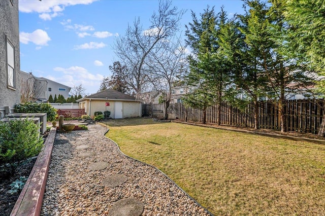 view of yard with an outbuilding, a fenced backyard, and central AC unit