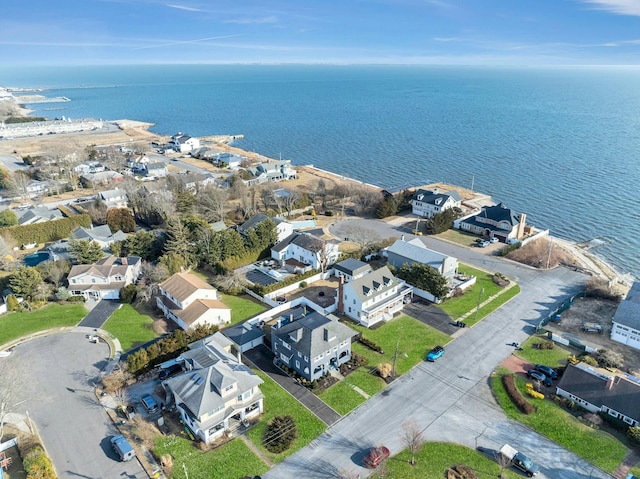 bird's eye view with a water view and a residential view