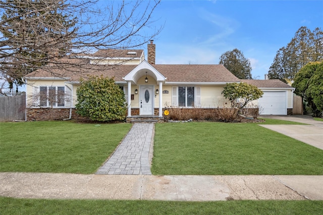 single story home featuring a garage, a front yard, concrete driveway, and a chimney